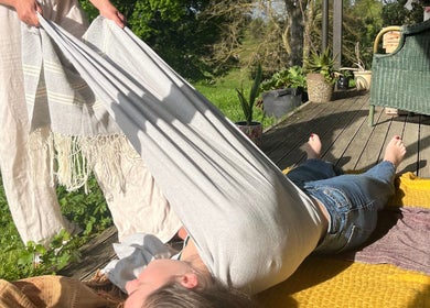 Relaxation session at Mumtra Doula, Gordonton, Waikato Region, NZ, featuring outdoor wellness therapy.