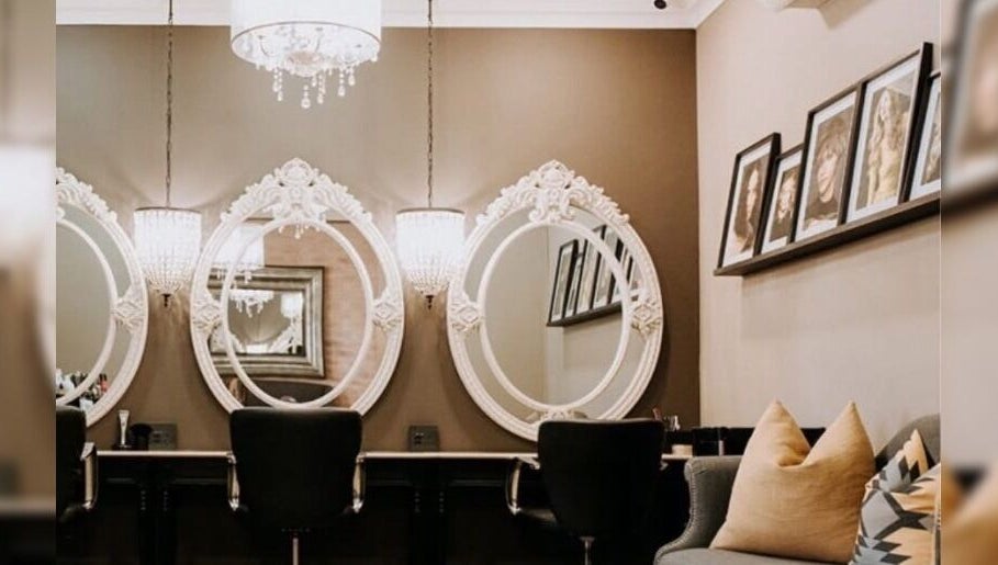 Chic salon mirrors and seating at Melissa’s Artistry Collective, North West, North West, ZA.