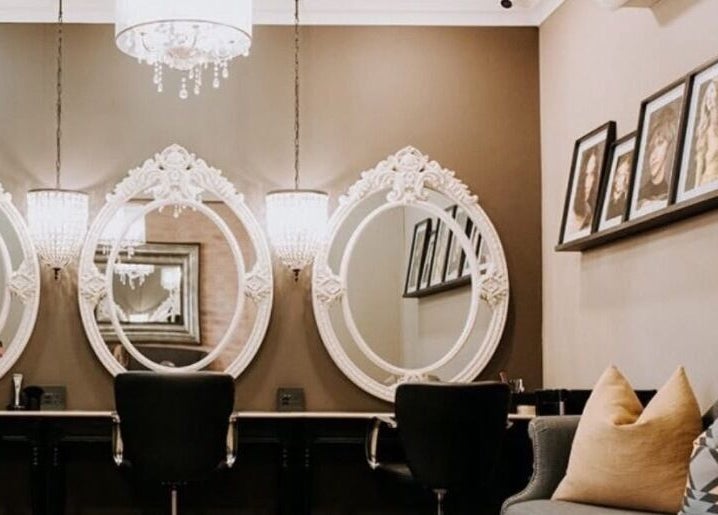 Chic salon mirrors and seating at Melissa’s Artistry Collective, North West, North West, ZA.
