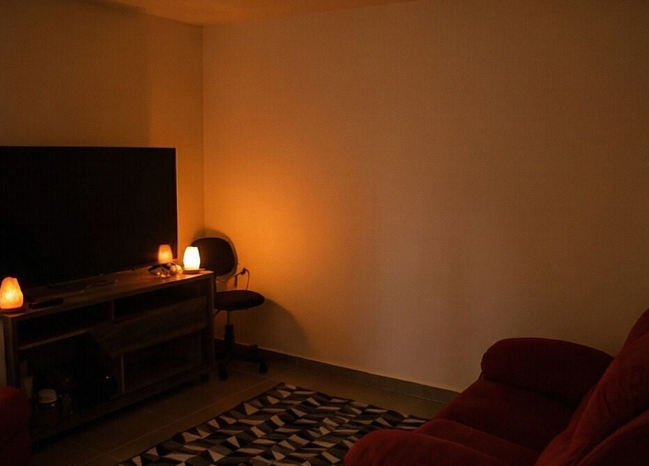 Sala aconchegante em ÁGUIDA Home Studio de Massagem Relaxante, São Paulo, São Paulo, BR.