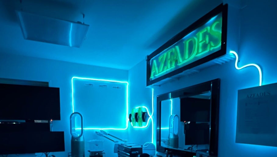 AZFADES-PRIVATE STUDIO in London, England, GB illuminated with blue neon lights for a modern wellness ambiance.