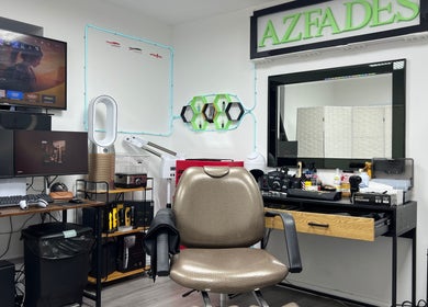 Modern setup at AZFADES- PRIVATE STUDIO, London, England, GB. Featuring sleek chairs and tech savviness.