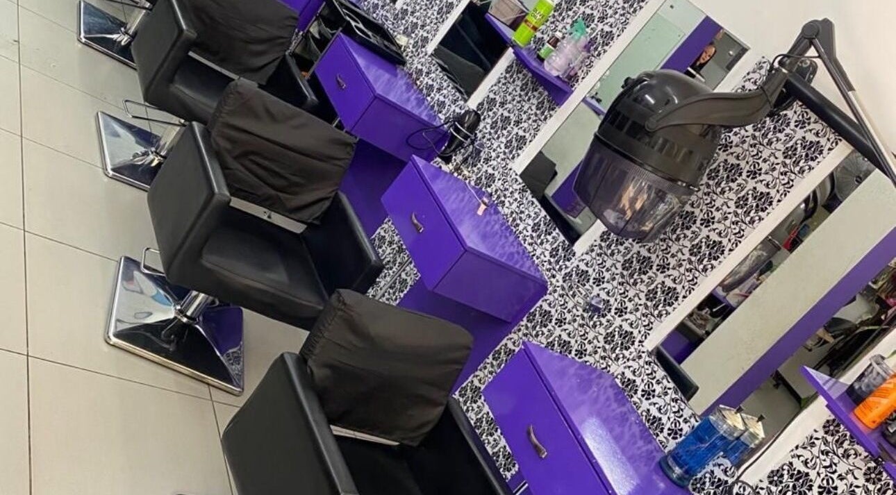 Chic hair styling stations at Serenity Beauty Parlour in Cape Town, Western Cape, ZA with elegant decor.