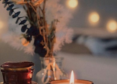 Warm candlelit ambiance at The Skin Sanctuary, Aylmer, Ontario, CA. Cozy wellness retreat atmosphere.