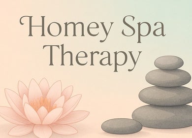 Relaxing spa ambiance at Homeyspatherapy, Delhi, Delhi, IN, featuring stones and lotus flower.