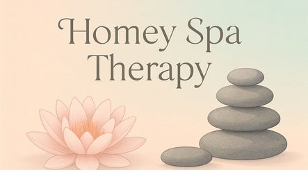 Relaxing spa ambiance at Homeyspatherapy, Delhi, Delhi, IN, featuring stones and lotus flower.