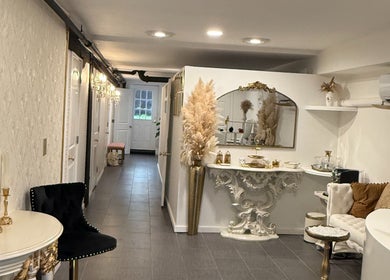 Elegant Spa Maluge lobby in Hoboken, New Jersey, US with chic decor and cozy seating.