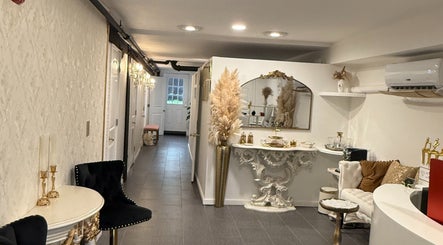 Elegant Spa Maluge lobby in Hoboken, New Jersey, US with chic decor and cozy seating.