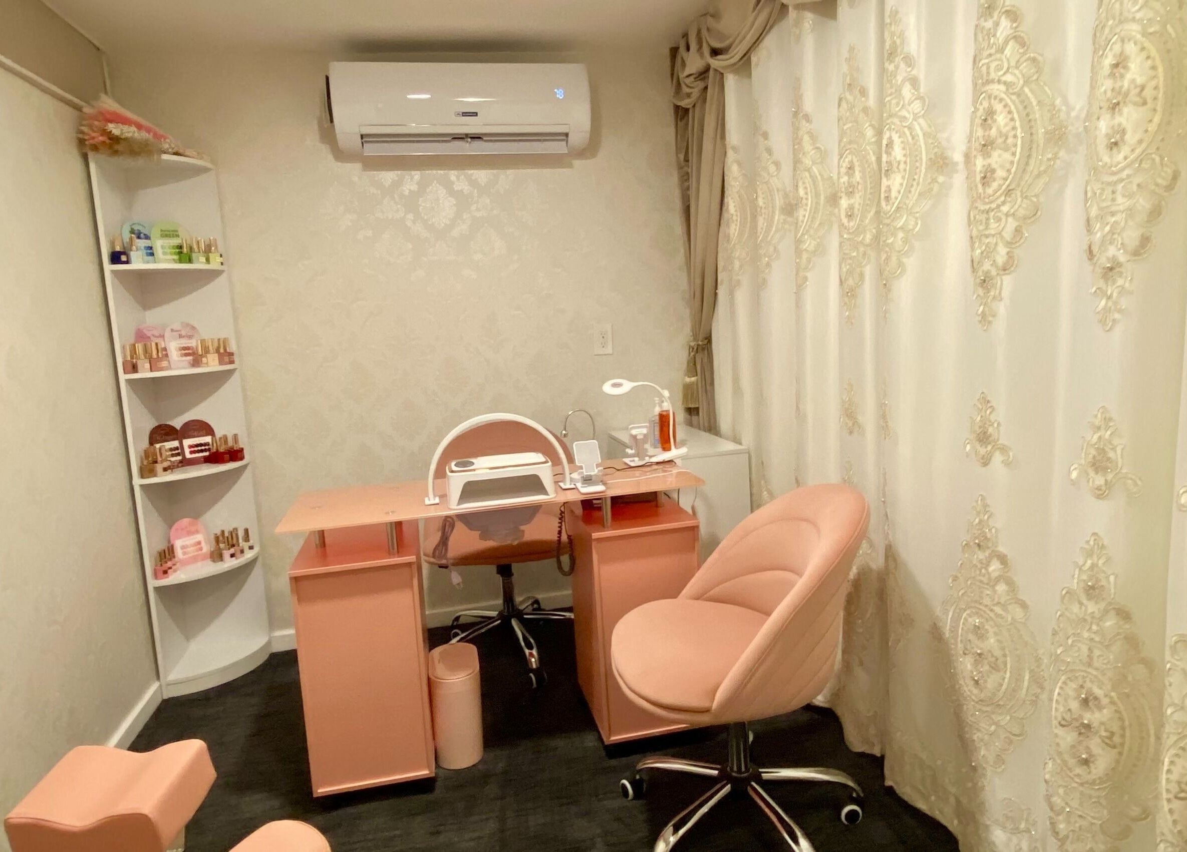 Luxurious nail treatment room at Spa Maluge, Hoboken, New Jersey, US, with plush seating and chic decor.