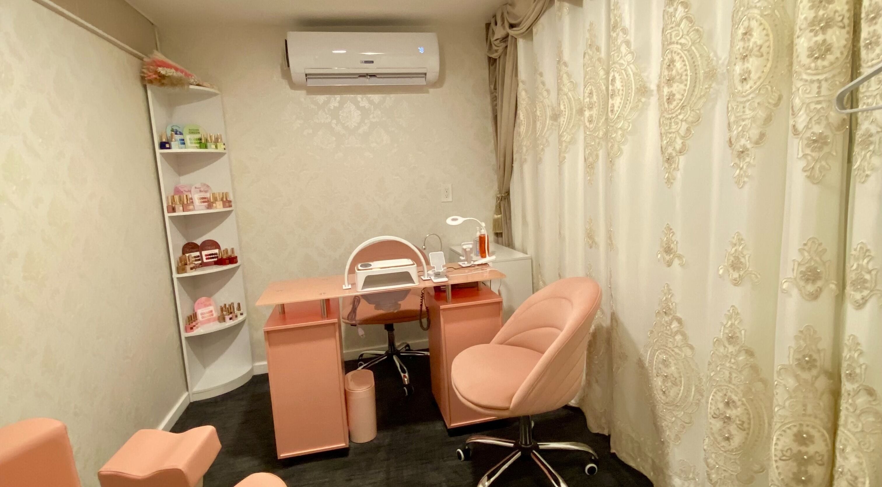 Luxurious nail treatment room at Spa Maluge, Hoboken, New Jersey, US, with plush seating and chic decor.