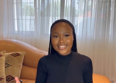 Modern lounge area at Blushery&Co in Gauteng, Gauteng, ZA, featuring cozy couch and elegant decor.