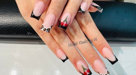 Elegant nail art with animal print and cherries at Violet Nails Salon By Vi At Allertons Leeds, Leeds, England, GB.