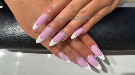 Stylish pink and white manicure at Violet Nails Salon By Vi At Allertons Leeds, Leeds, England, GB.