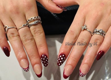 Polka dot and red french nail art at Violet Nails Salon By Vi At Allertons Leeds, Leeds, England, GB.