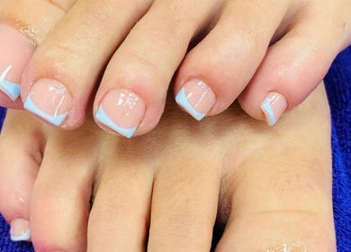 Elegant pastel French pedicure at Violet Nails Salon By Vi At Allertons Leeds, Leeds, England, GB.