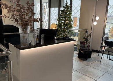 Cozy reception at Violet Nails Salon By Vi At Allertons Leeds, featuring chic decor. Leeds, England, GB.