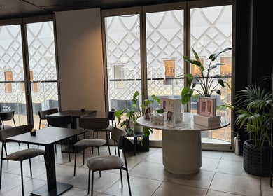 Modern interior of Violet Nails Salon By Vi At Allertons Leeds with seating and products, Leeds, England, GB.