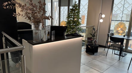 Welcoming reception area at Violet Nails Salon By Vi At Allertons Leeds, Leeds, England, GB, with modern decor.