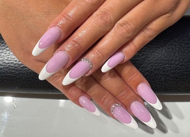 Elegant nail art at Violet Nails Salon By Vi At Allertons Leeds, featuring pink and white designs. Leeds, England, GB.