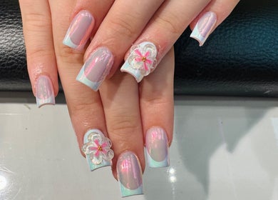 Elegant floral nail art at Violet Nails Salon By Vi At Allertons Leeds, Leeds, England, GB.