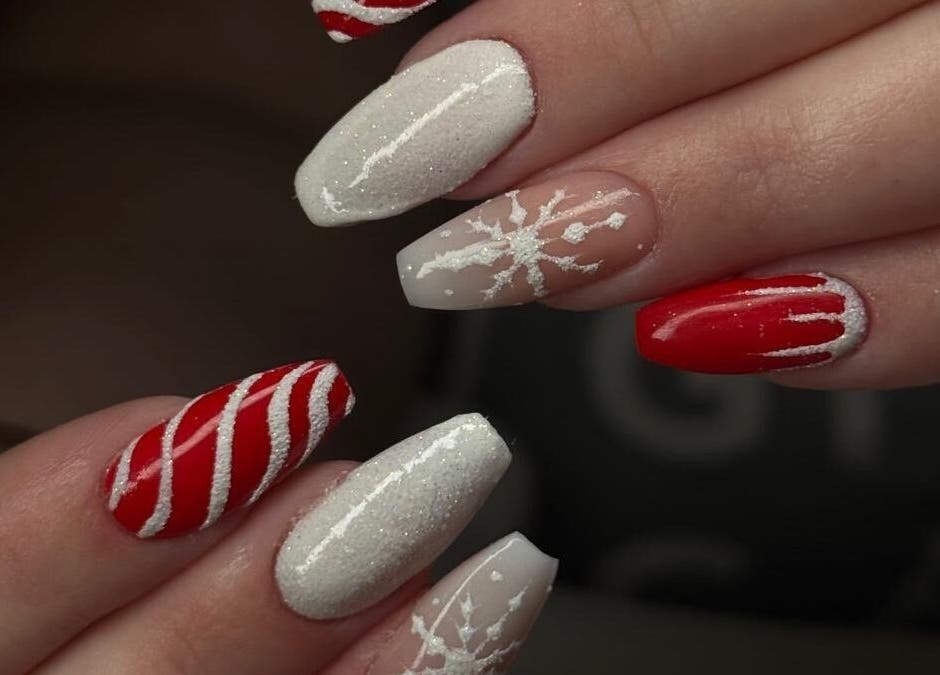 Festive red and white nail art at Madison - Beauty Studio, Poole, England, GB.