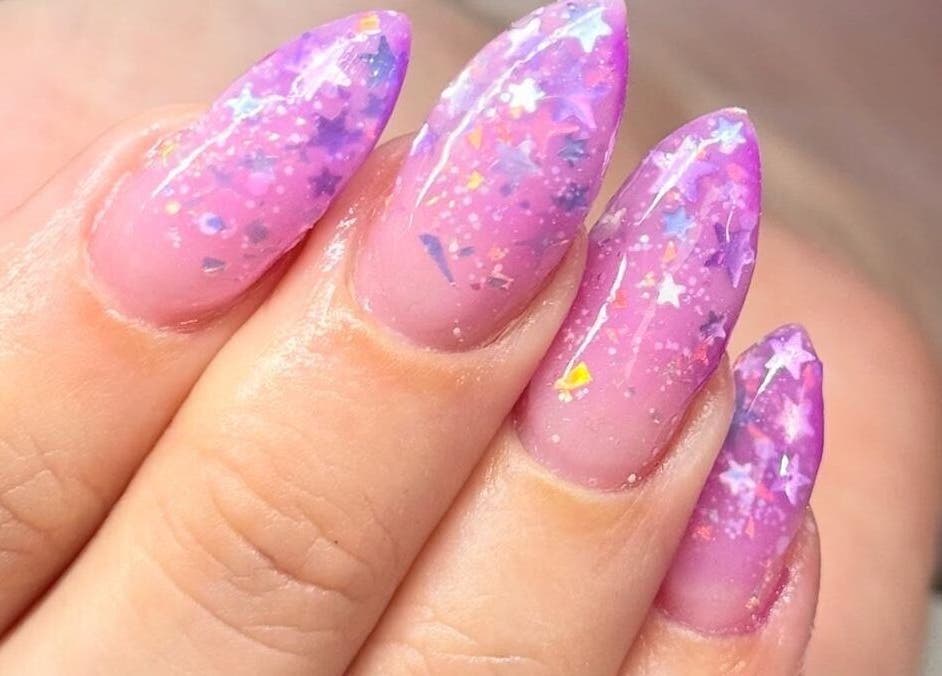 Sparkling starry nail art at Madison - Beauty Studio in Poole, England, GB. Perfect for a unique look.