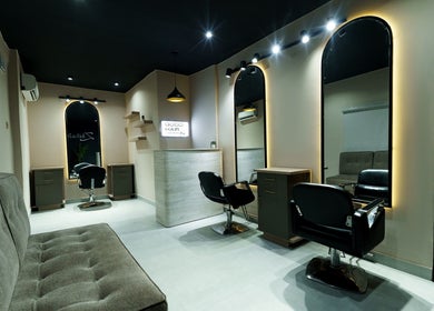 Stylish interior of Zhihairspa salon in Port Harcourt, Rivers, NG with elegant chairs and mirrors.