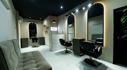 Stylish interior of Zhihairspa salon in Port Harcourt, Rivers, NG with elegant chairs and mirrors.
