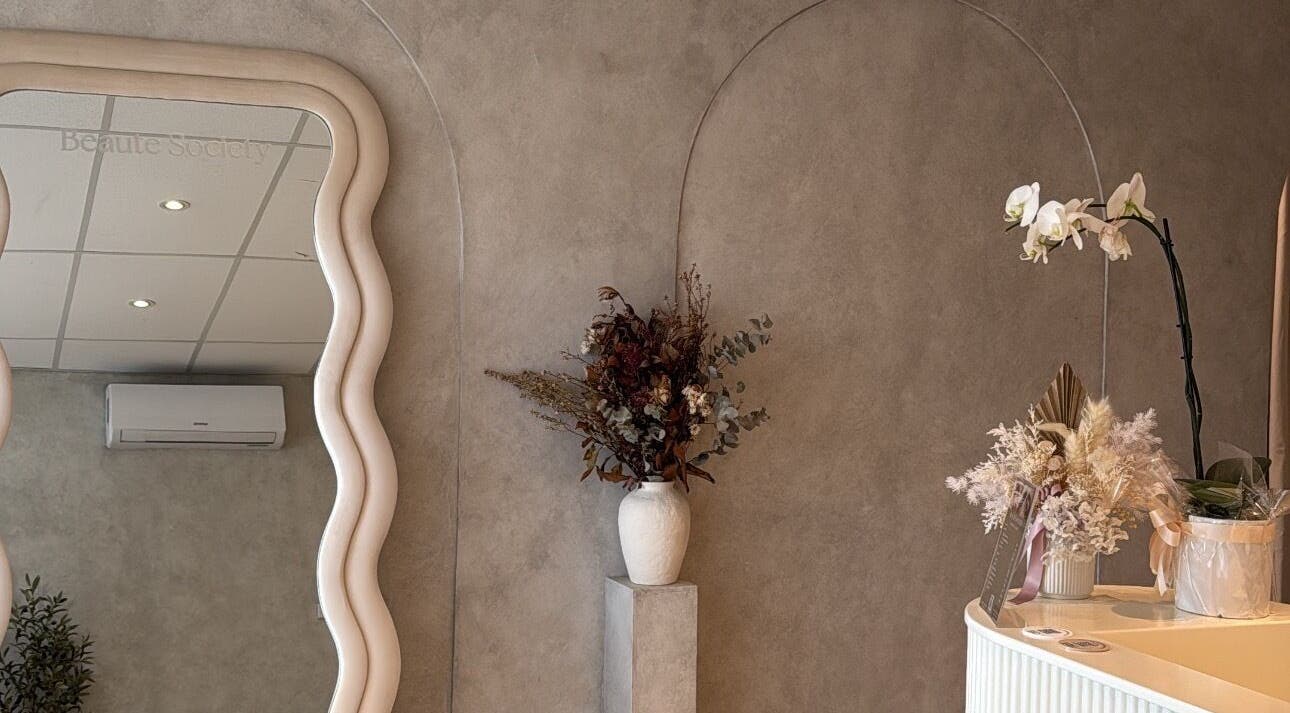 Stylish mirror and floral decor at Beauty Artistry, Rosebery, New South Wales, AU.