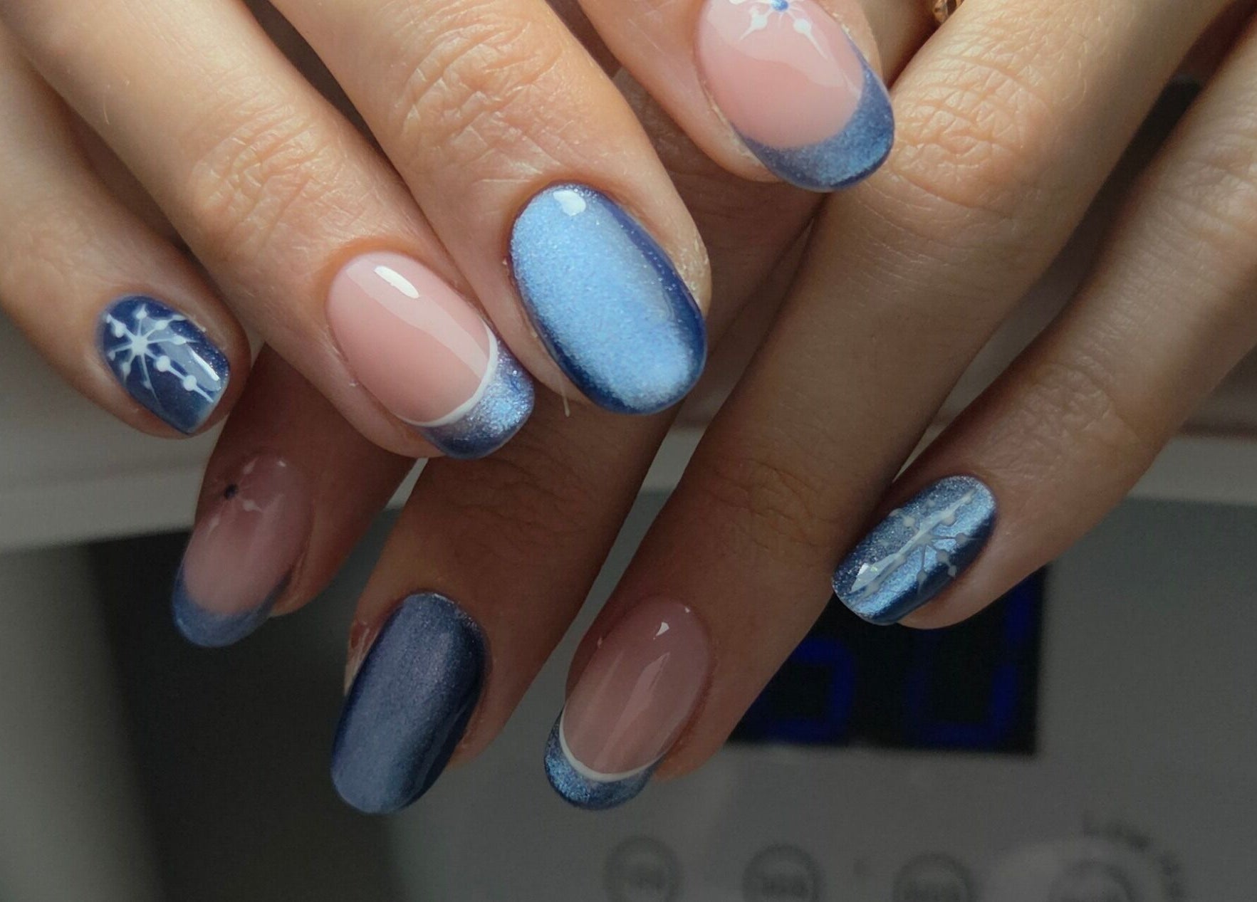Elegant blue and pink nail art at Gloss & Glitter in Petworth, England, GB. Perfect for stylish occasions.