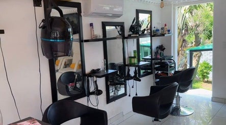 Modern salon interior at Mellyz Beauty Studio, Randburg, Gauteng, ZA with contemporary decor and styling chairs.