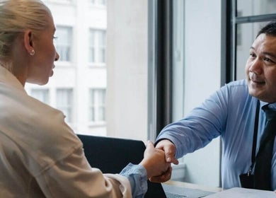 Two professionals shaking hands at Precision Driver Medicals- 83 Carver Street, Birmingham, England, GB.