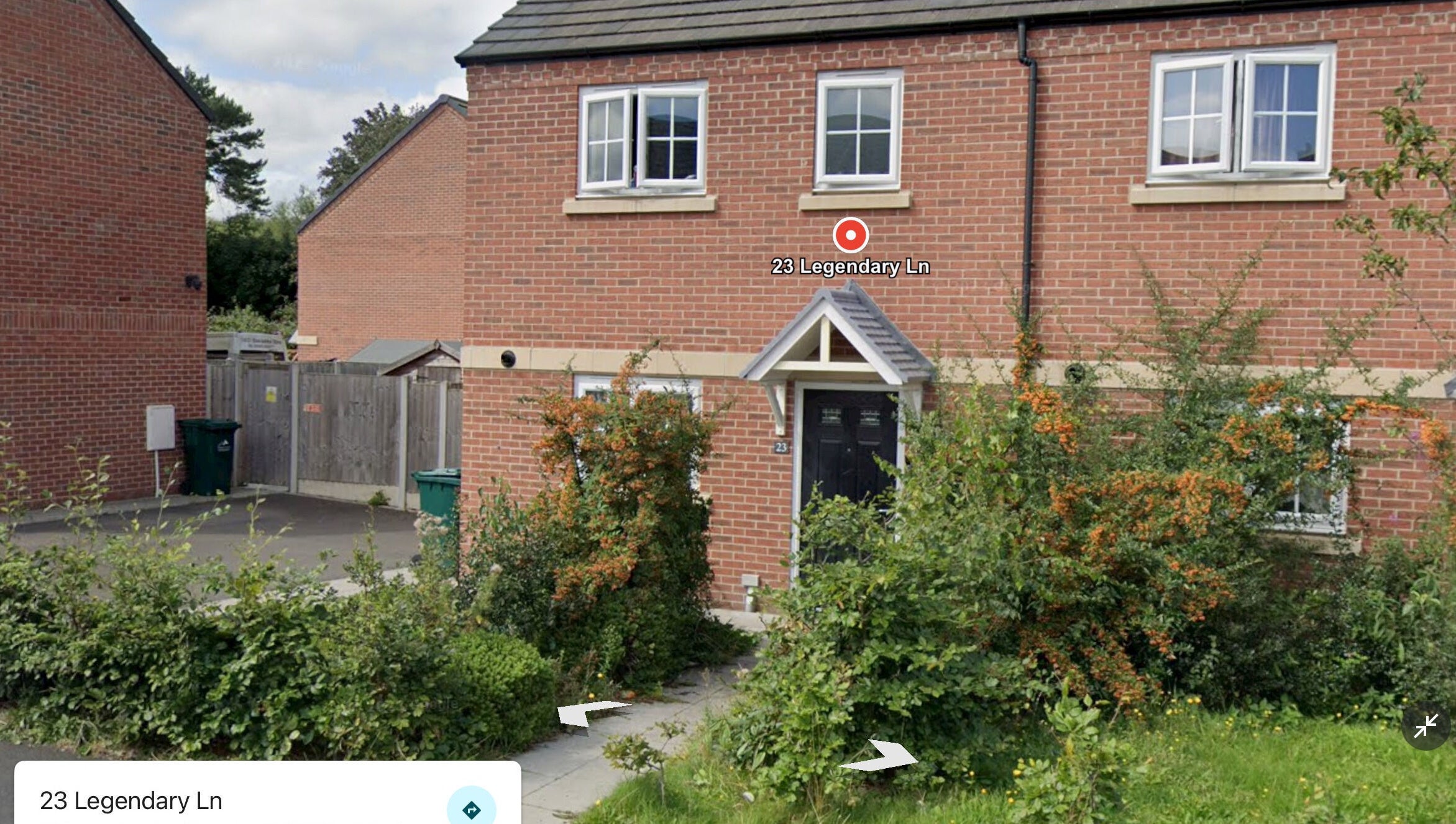 Front view of Nailed by Ells, a cozy beauty venue in Coventry, England, GB with lush greenery outside.