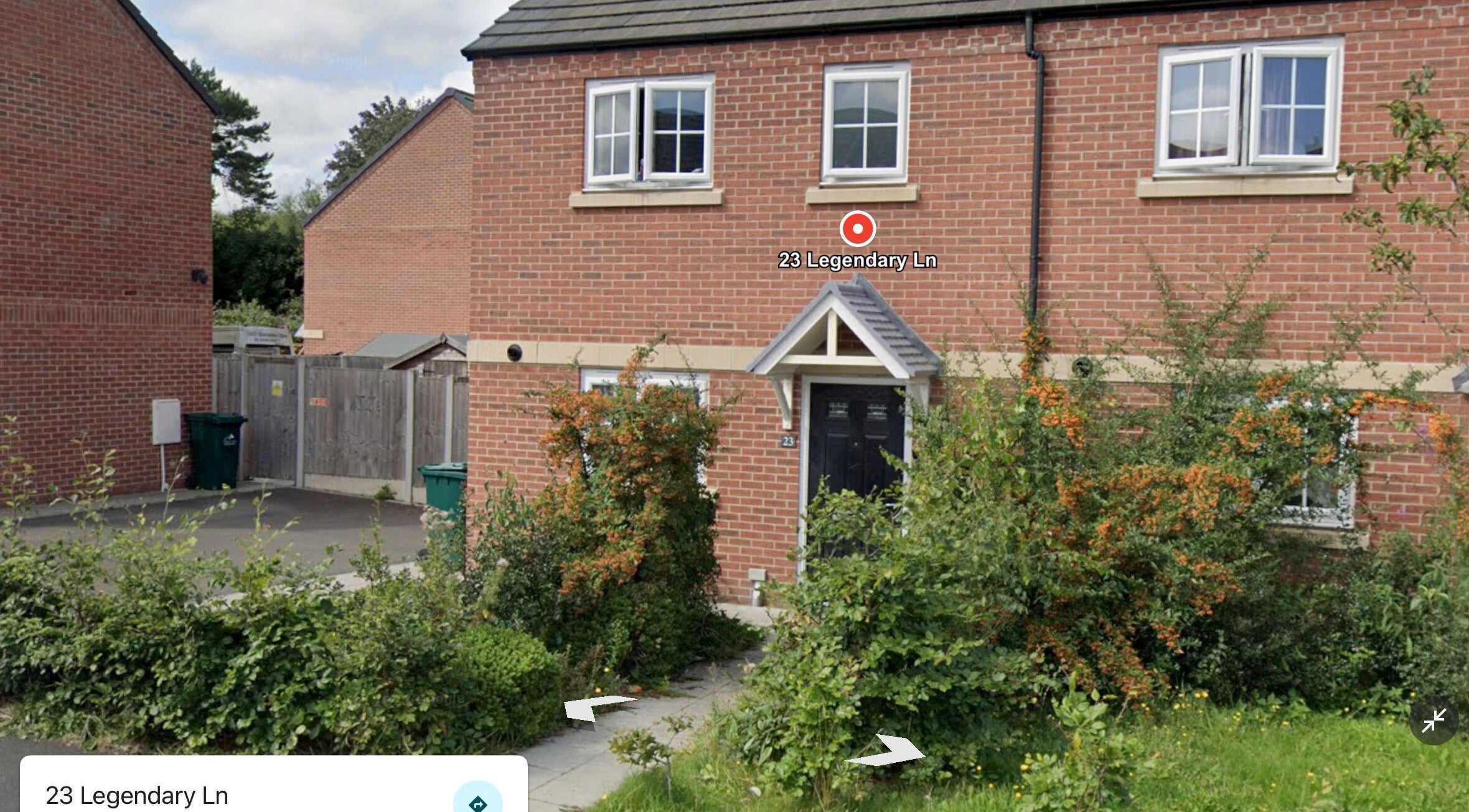 Front view of Nailed by Ells, a cozy beauty venue in Coventry, England, GB with lush greenery outside.