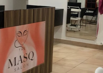 Reception area at The Masq Salon, Benoni, Gauteng, ZA, showcasing modern design and welcoming environment.