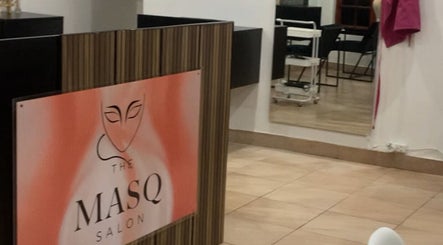 Reception area at The Masq Salon, Benoni, Gauteng, ZA, showcasing modern design and welcoming environment.