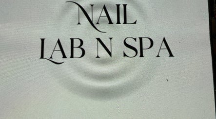 Elegant logo of Nail Lab n Spa in Oshawa, Ontario, CA with stylish typography.