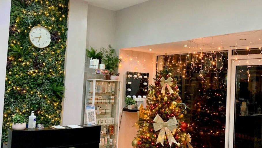 Festive interior at Beautyby Lgs, Gateshead, England, GB adorned with holiday decor and fairy lights.