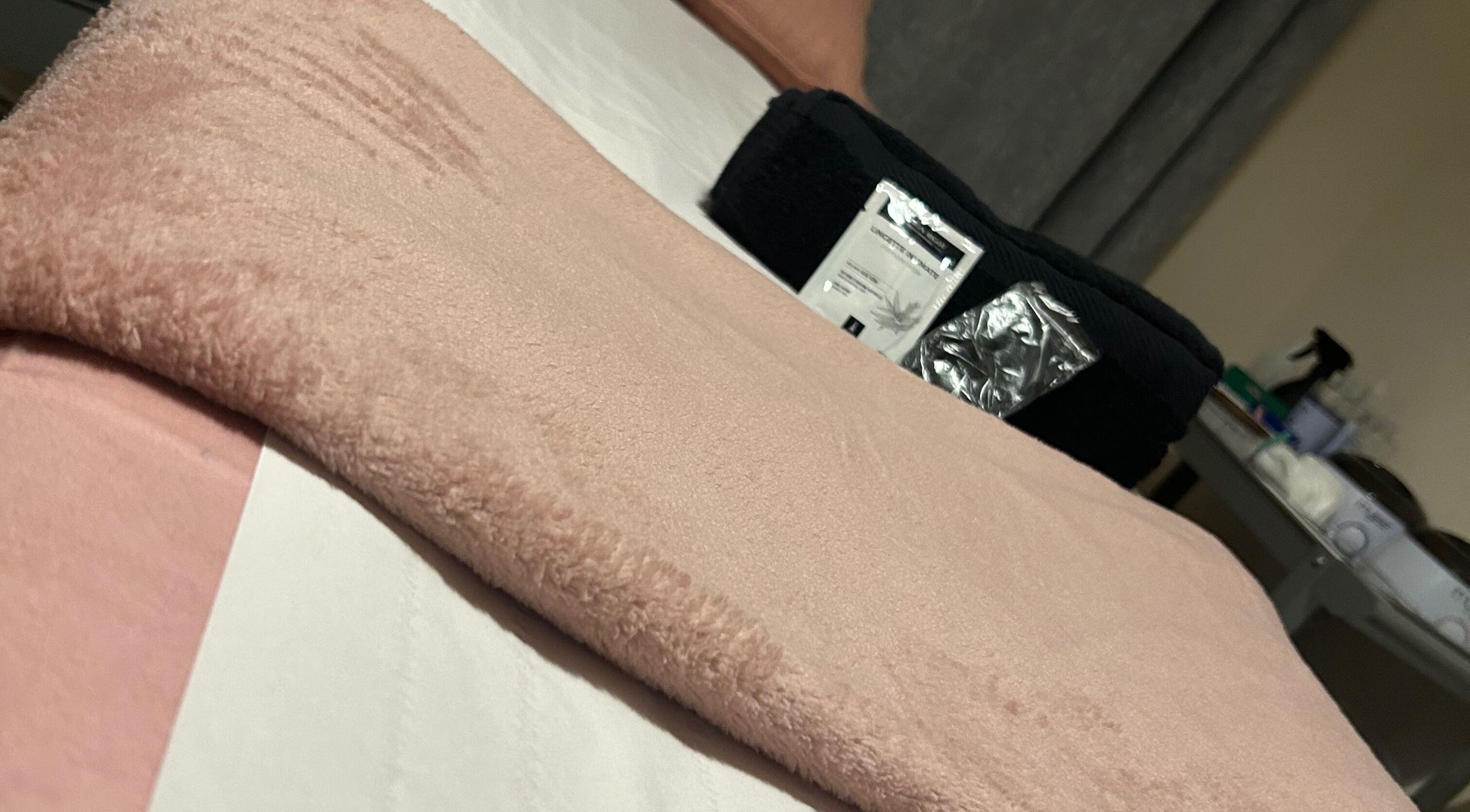 Warm, inviting waxing table at Bare & Bonnie Waxing in Banbury, England, GB, ready for pampering sessions.