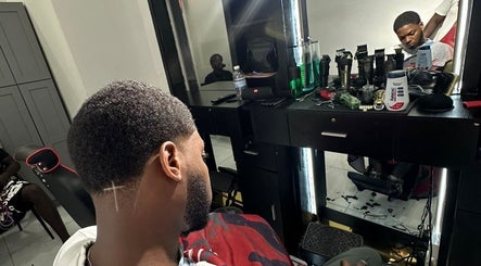 Client receives a stylish haircut at Theblazebarbershop, Kingston, St. Andrew Parish, JM.