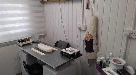 Modern nail treatment station at Hairabelles, Bolton, England, GB. Elegant setup for beauty services.