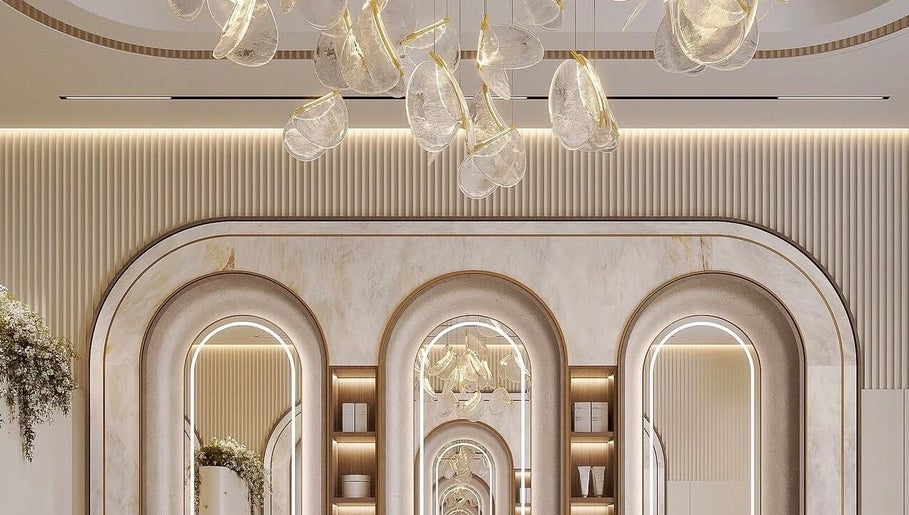Luxurious interior at Laviish Luxe Beauty, Houston, Texas, US featuring arched mirrors and elegant lighting.