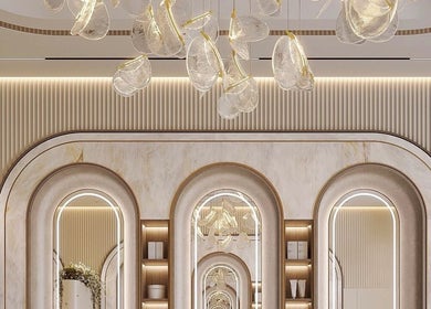 Luxurious interior at Laviish Luxe Beauty, Houston, Texas, US featuring arched mirrors and elegant lighting.