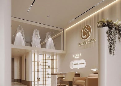 Interior of Laviish Luxe Beauty in Houston, Texas, US, showcasing chic salon design with bridal gowns and modern decor.