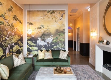 Elegant lounge at Bonded- hair by Tess in Melbourne, Victoria, AU with scenic wallpaper and cozy seating.