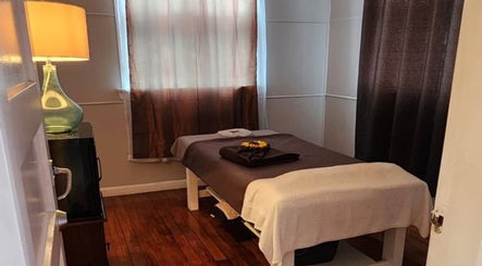 Tranquil massage room at Thai Massage By Alice, Gisborne, Gisborne Region, NZ with a cozy bed and soft lighting.