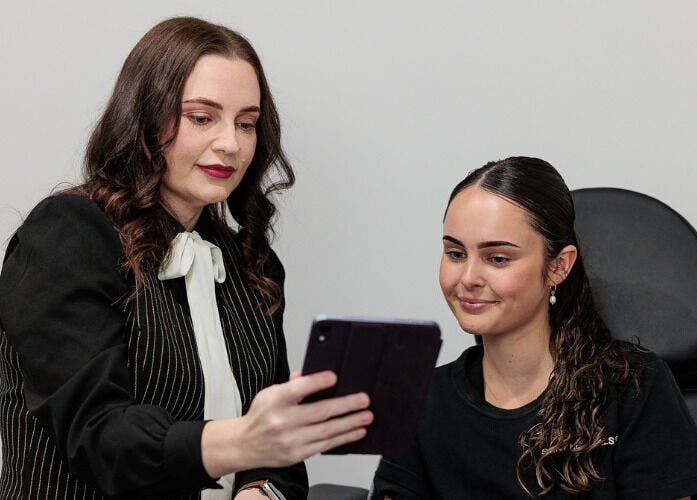 Client consultation at Emma McCulloch Tattoo Removal & Aesthetics, Everton Park, Queensland, AU.