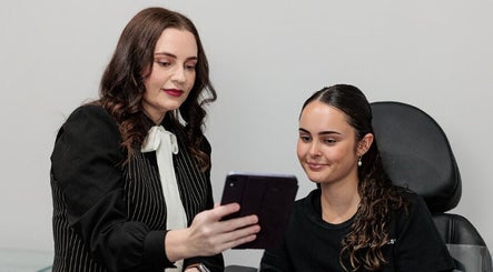 Client consultation at Emma McCulloch Tattoo Removal & Aesthetics, Everton Park, Queensland, AU.