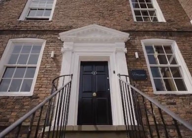 Entrance of Abigail Louise Aesthetics in Chester, England, GB, showcasing its elegant brick facade.