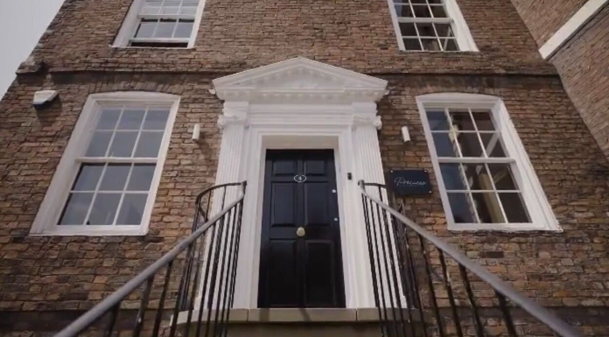 Entrance of Abigail Louise Aesthetics in Chester, England, GB, showcasing its elegant brick facade.